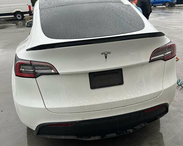 Белый Тесла Model Y, объемом двигателя 0 л и пробегом 74 тыс. км за 19000 $, фото 2 на Automoto.ua