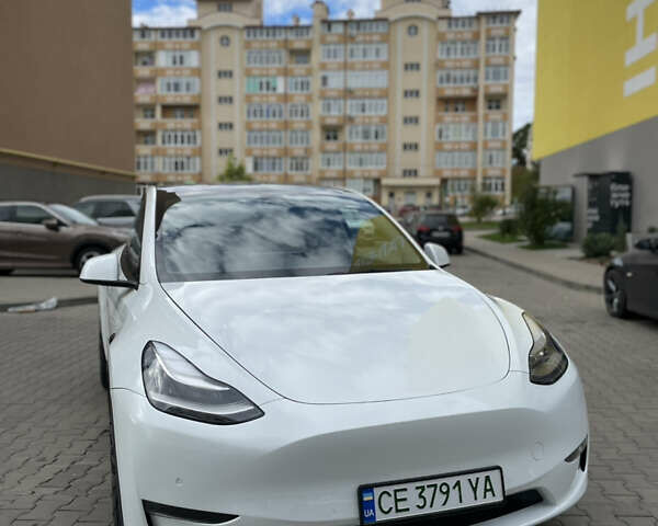 Белый Тесла Model Y, объемом двигателя 0 л и пробегом 65 тыс. км за 22999 $, фото 1 на Automoto.ua