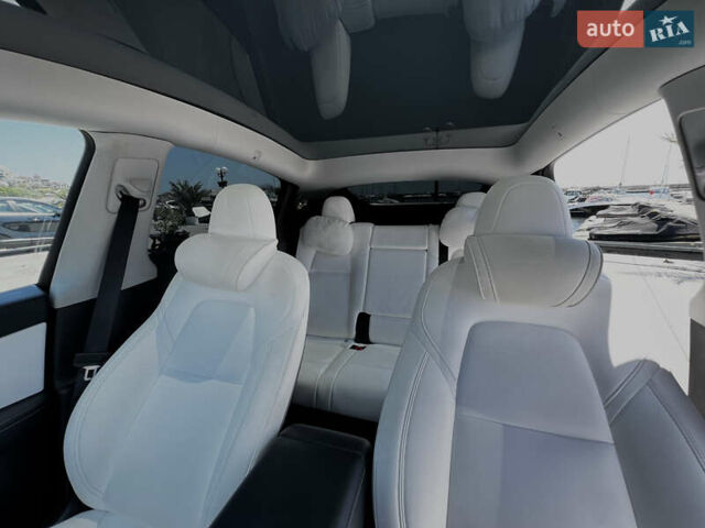 Белый Тесла Model Y, объемом двигателя 0 л и пробегом 61 тыс. км за 28000 $, фото 26 на Automoto.ua