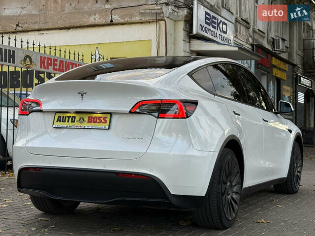 Тесла Model Y 2021 в Николаеве на Automoto.ua Белый Тесла Model Y, объемом двигателя 0 л и пробегом 80 тыс. км за 24999 $, фото 18 на Automoto.ua