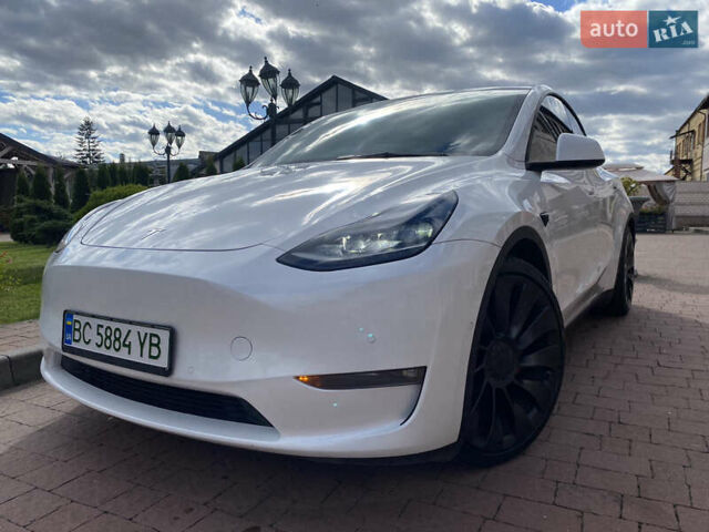 Белый Тесла Model Y, объемом двигателя 0 л и пробегом 130 тыс. км за 23000 $, фото 2 на Automoto.ua