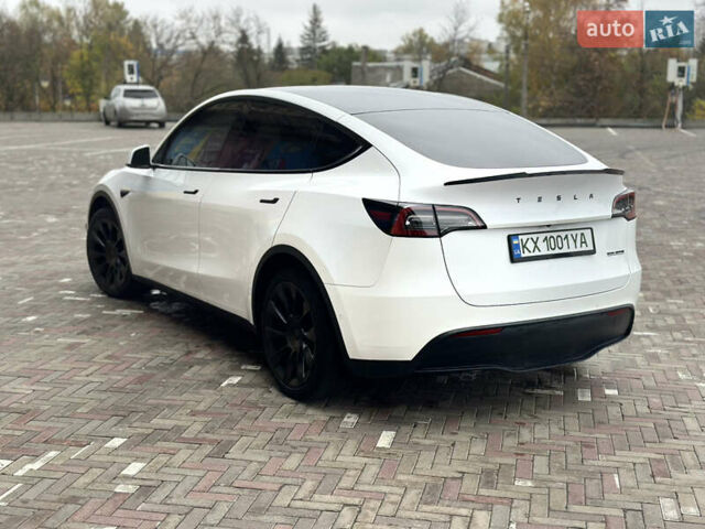Білий Тесла Model Y, об'ємом двигуна 0 л та пробігом 85 тис. км за 26700 $, фото 5 на Automoto.ua