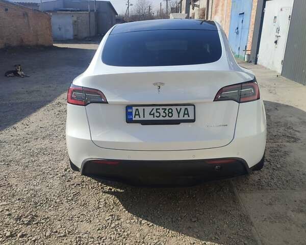 Белый Тесла Model Y, объемом двигателя 0 л и пробегом 76 тыс. км за 23000 $, фото 3 на Automoto.ua