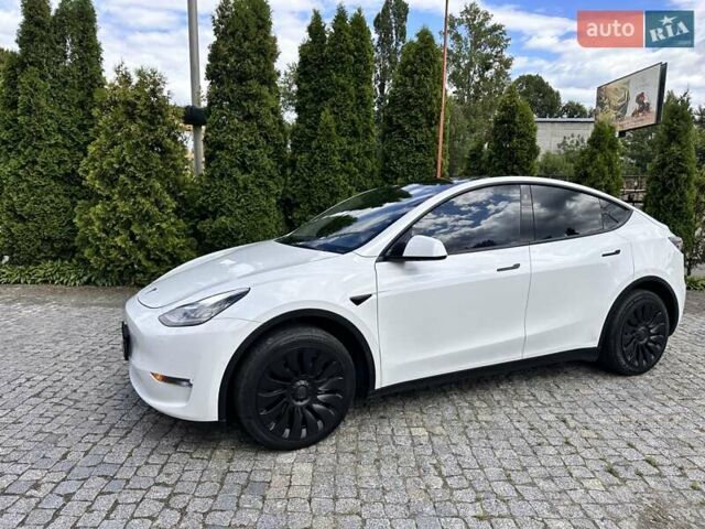 Белый Тесла Model Y, объемом двигателя 0 л и пробегом 80 тыс. км за 22300 $, фото 2 на Automoto.ua