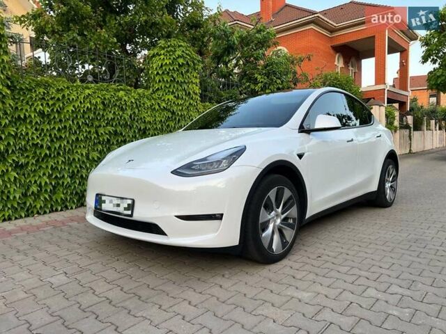 Белый Тесла Model Y, объемом двигателя 0 л и пробегом 69 тыс. км за 24900 $, фото 1 на Automoto.ua