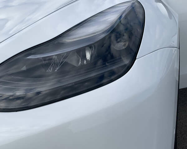 Белый Тесла Model Y, объемом двигателя 0 л и пробегом 83 тыс. км за 19499 $, фото 16 на Automoto.ua