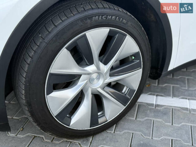 Тесла Model Y 2021 в Хмельницком на Automoto.ua Белый Тесла Model Y, объемом двигателя 0 л и пробегом 83 тыс. км за 25499 $, фото 28 на Automoto.ua