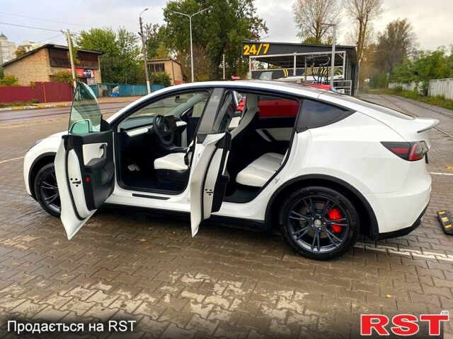 Тесла Model Y 2021 в Ирпене на Automoto.ua Белый Тесла Model Y, объемом двигателя 0 л и пробегом 80 тыс. км за 26700 $, фото 9 на Automoto.ua