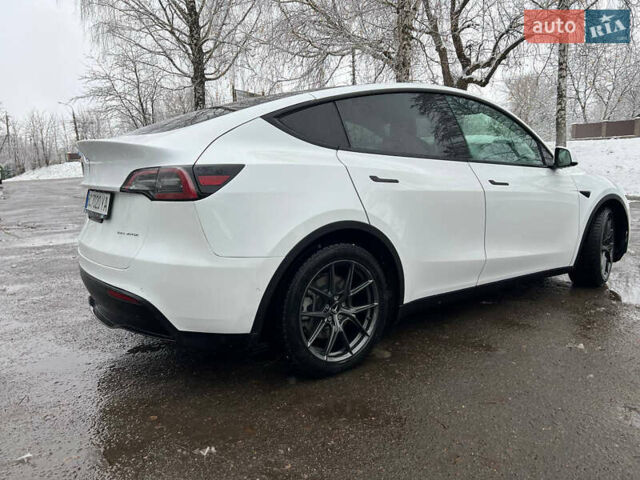 Білий Тесла Model Y, об'ємом двигуна 0 л та пробігом 88 тис. км за 24900 $, фото 19 на Automoto.ua