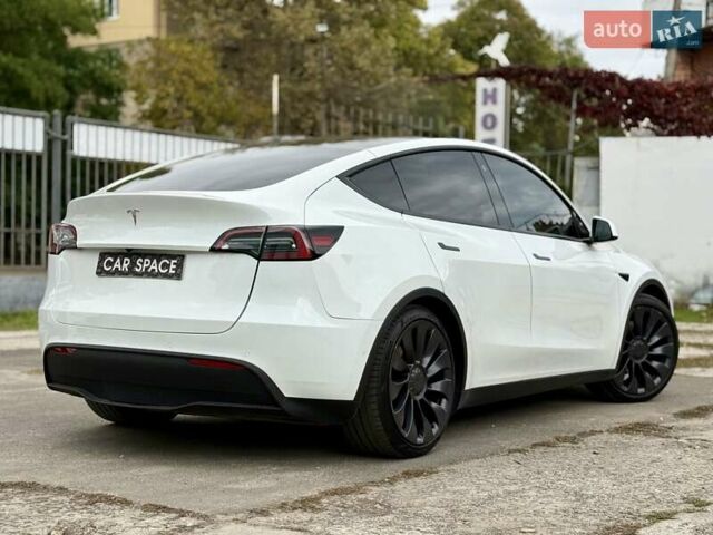 Белый Тесла Model Y, объемом двигателя 0 л и пробегом 88 тыс. км за 26999 $, фото 7 на Automoto.ua