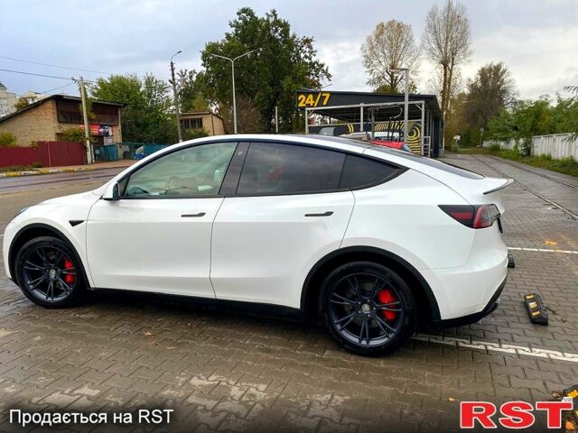 Тесла Model Y 2021 в Ирпене на Automoto.ua Белый Тесла Model Y, объемом двигателя 0 л и пробегом 80 тыс. км за 26700 $, фото 3 на Automoto.ua