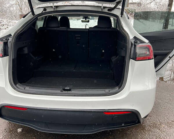 Білий Тесла Model Y, об'ємом двигуна 0 л та пробігом 88 тис. км за 24900 $, фото 21 на Automoto.ua