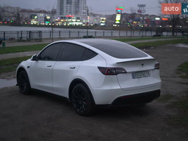 Білий Тесла Model Y, об'ємом двигуна 0 л та пробігом 66 тис. км за 23500 $, фото 57 на Automoto.ua