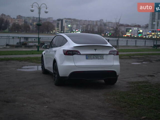Білий Тесла Model Y, об'ємом двигуна 0 л та пробігом 66 тис. км за 23500 $, фото 59 на Automoto.ua