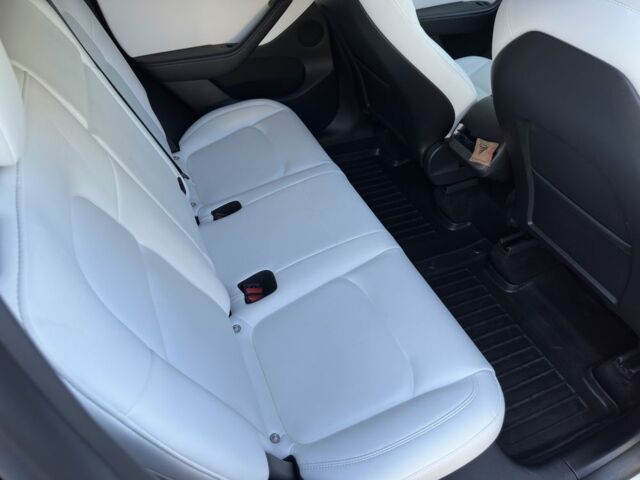 Білий Тесла Model Y, об'ємом двигуна 0 л та пробігом 73 тис. км за 29400 $, фото 15 на Automoto.ua