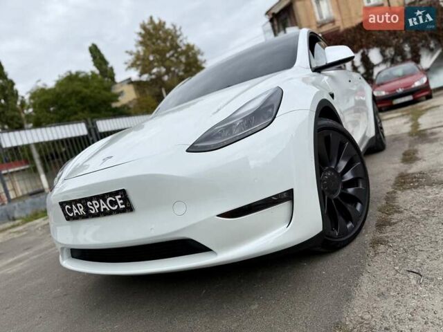 Белый Тесла Model Y, объемом двигателя 0 л и пробегом 88 тыс. км за 26999 $, фото 2 на Automoto.ua