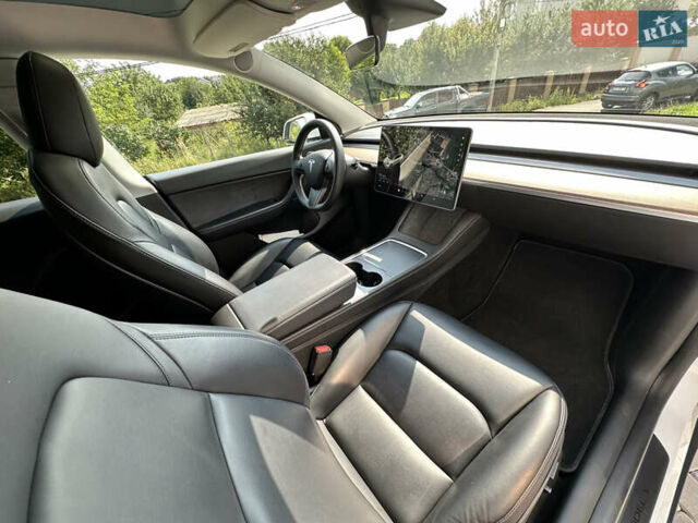 Білий Тесла Model Y, об'ємом двигуна 0 л та пробігом 70 тис. км за 26700 $, фото 17 на Automoto.ua