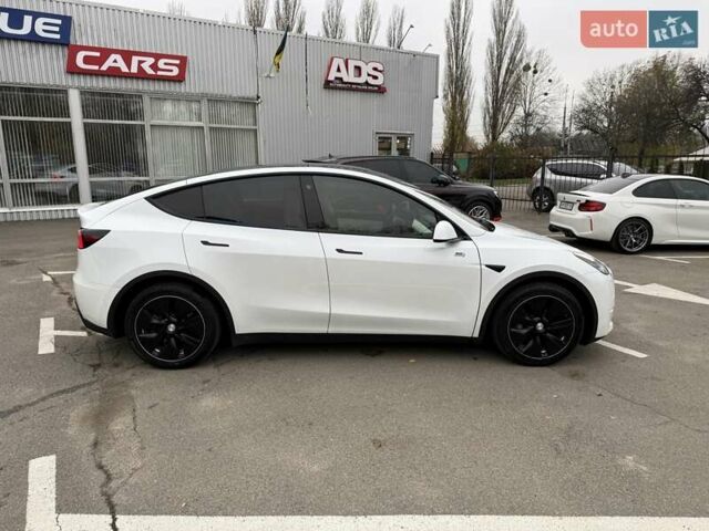 Белый Тесла Model Y, объемом двигателя 0 л и пробегом 80 тыс. км за 25500 $, фото 1 на Automoto.ua