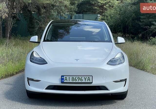 Белый Тесла Model Y, объемом двигателя 0 л и пробегом 65 тыс. км за 29999 $, фото 2 на Automoto.ua