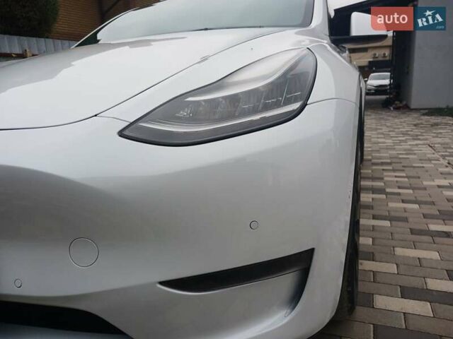 Белый Тесла Model Y, объемом двигателя 0 л и пробегом 195 тыс. км за 26000 $, фото 27 на Automoto.ua
