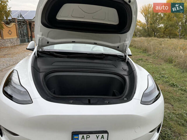 Белый Тесла Model Y, объемом двигателя 0 л и пробегом 73 тыс. км за 24500 $, фото 5 на Automoto.ua