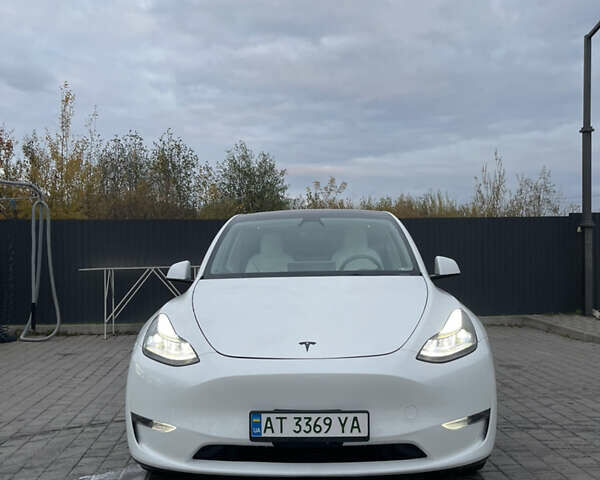 Белый Тесла Model Y, объемом двигателя 0 л и пробегом 55 тыс. км за 28000 $, фото 11 на Automoto.ua