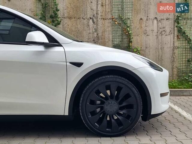 Белый Тесла Model Y, объемом двигателя 0 л и пробегом 98 тыс. км за 26499 $, фото 11 на Automoto.ua