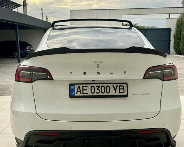 Белый Тесла Model Y, объемом двигателя 0 л и пробегом 180 тыс. км за 23000 $, фото 2 на Automoto.ua