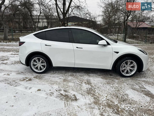 Белый Тесла Model Y, объемом двигателя 0 л и пробегом 60 тыс. км за 29900 $, фото 18 на Automoto.ua