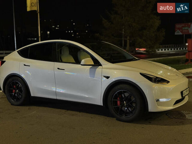 Белый Тесла Model Y, объемом двигателя 0 л и пробегом 58 тыс. км за 26250 $, фото 1 на Automoto.ua