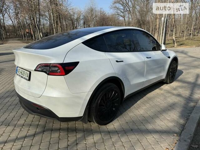 Белый Тесла Model Y, объемом двигателя 0 л и пробегом 56 тыс. км за 40500 $, фото 24 на Automoto.ua