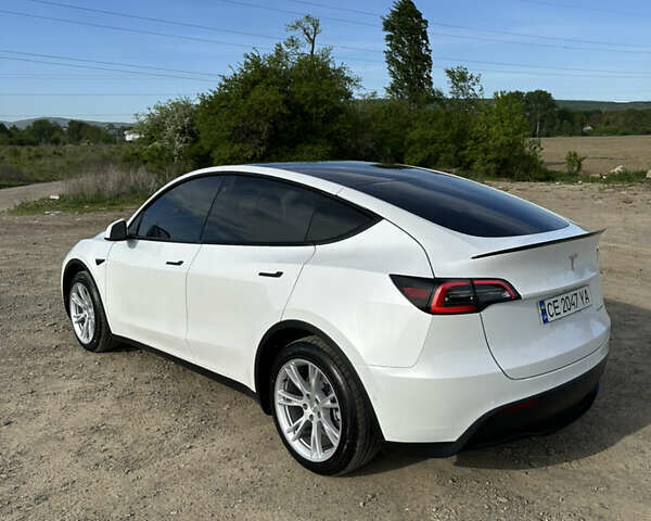 Белый Тесла Model Y, объемом двигателя 0 л и пробегом 92 тыс. км за 31000 $, фото 3 на Automoto.ua