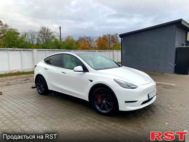 Тесла Model Y 2021 в Ирпене на Automoto.ua Белый Тесла Model Y, объемом двигателя 0 л и пробегом 80 тыс. км за 26700 $, фото 2 на Automoto.ua