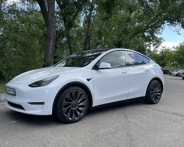 Белый Тесла Model Y, объемом двигателя 0 л и пробегом 52 тыс. км за 34700 $, фото 1 на Automoto.ua