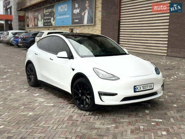 Білий Тесла Model Y, об'ємом двигуна 0 л та пробігом 85 тис. км за 26700 $, фото 1 на Automoto.ua