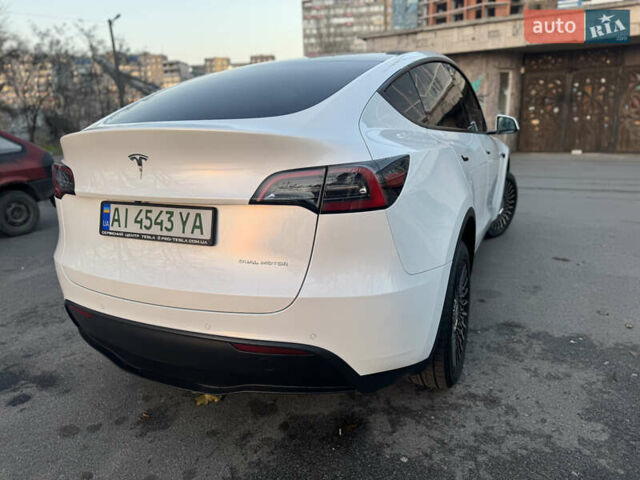 Білий Тесла Model Y, об'ємом двигуна 0 л та пробігом 55 тис. км за 24990 $, фото 4 на Automoto.ua