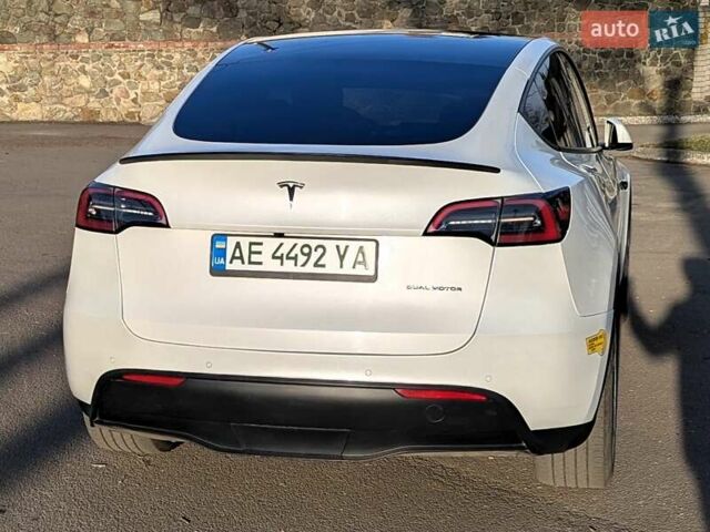 Білий Тесла Model Y, об'ємом двигуна 0 л та пробігом 101 тис. км за 23899 $, фото 22 на Automoto.ua