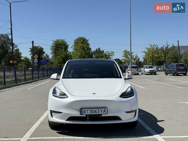 Белый Тесла Model Y, объемом двигателя 0 л и пробегом 110 тыс. км за 27750 $, фото 1 на Automoto.ua
