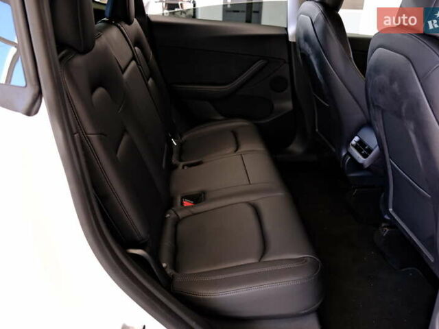 Белый Тесла Model Y, объемом двигателя 0 л и пробегом 19 тыс. км за 28900 $, фото 27 на Automoto.ua