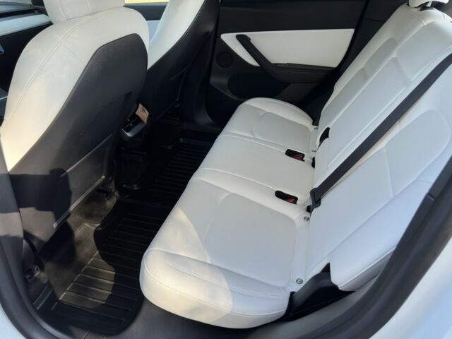 Білий Тесла Model Y, об'ємом двигуна 0 л та пробігом 73 тис. км за 29400 $, фото 16 на Automoto.ua