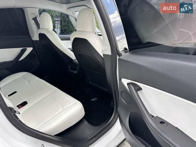 Белый Тесла Model Y, объемом двигателя 0 л и пробегом 80 тыс. км за 22300 $, фото 19 на Automoto.ua