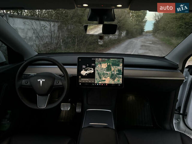Белый Тесла Model Y, объемом двигателя 0 л и пробегом 57 тыс. км за 30000 $, фото 32 на Automoto.ua