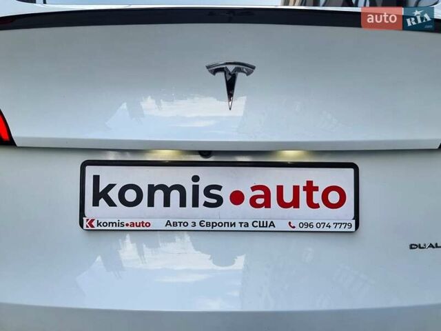 Белый Тесла Model Y, объемом двигателя 0 л и пробегом 98 тыс. км за 26499 $, фото 59 на Automoto.ua