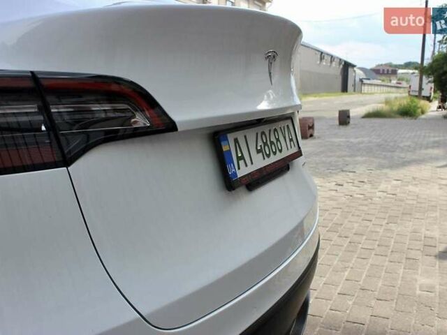Белый Тесла Model Y, объемом двигателя 0 л и пробегом 67 тыс. км за 27000 $, фото 16 на Automoto.ua