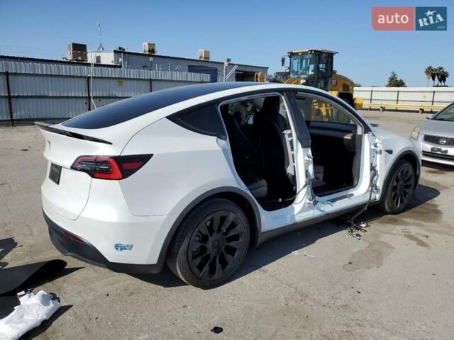 Белый Тесла Model Y, объемом двигателя 0 л и пробегом 74 тыс. км за 19000 $, фото 3 на Automoto.ua