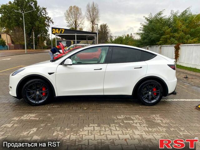 Тесла Model Y 2021 в Ирпене на Automoto.ua Белый Тесла Model Y, объемом двигателя 0 л и пробегом 80 тыс. км за 26700 $, фото 6 на Automoto.ua
