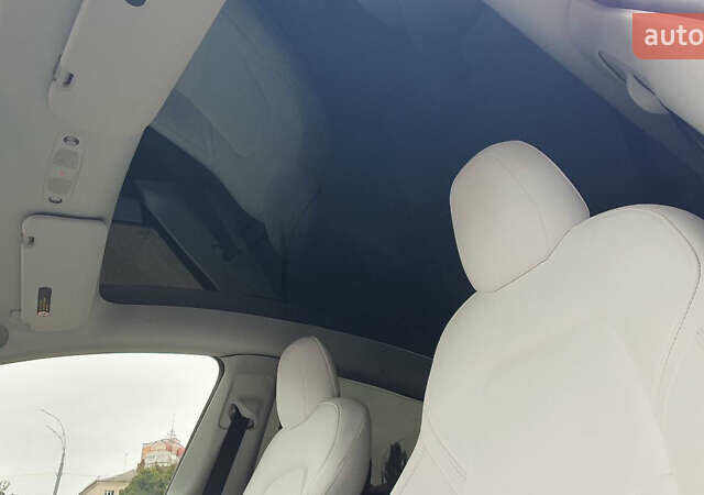 Білий Тесла Model Y, об'ємом двигуна 0 л та пробігом 74 тис. км за 25900 $, фото 20 на Automoto.ua