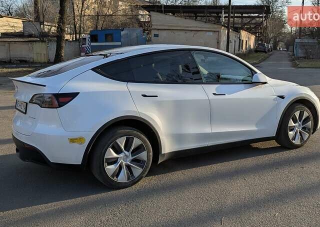 Білий Тесла Model Y, об'ємом двигуна 0 л та пробігом 101 тис. км за 23899 $, фото 4 на Automoto.ua