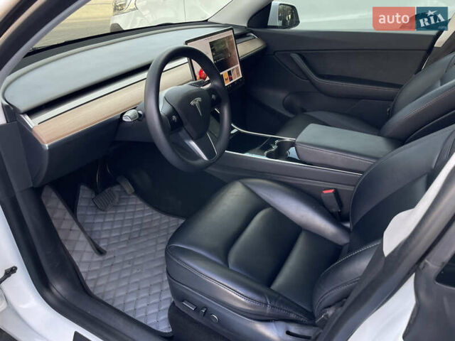 Белый Тесла Model Y, объемом двигателя 0 л и пробегом 78 тыс. км за 22900 $, фото 19 на Automoto.ua