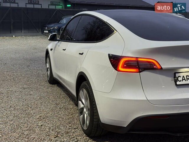 Белый Тесла Model Y, объемом двигателя 0 л и пробегом 128 тыс. км за 22600 $, фото 13 на Automoto.ua